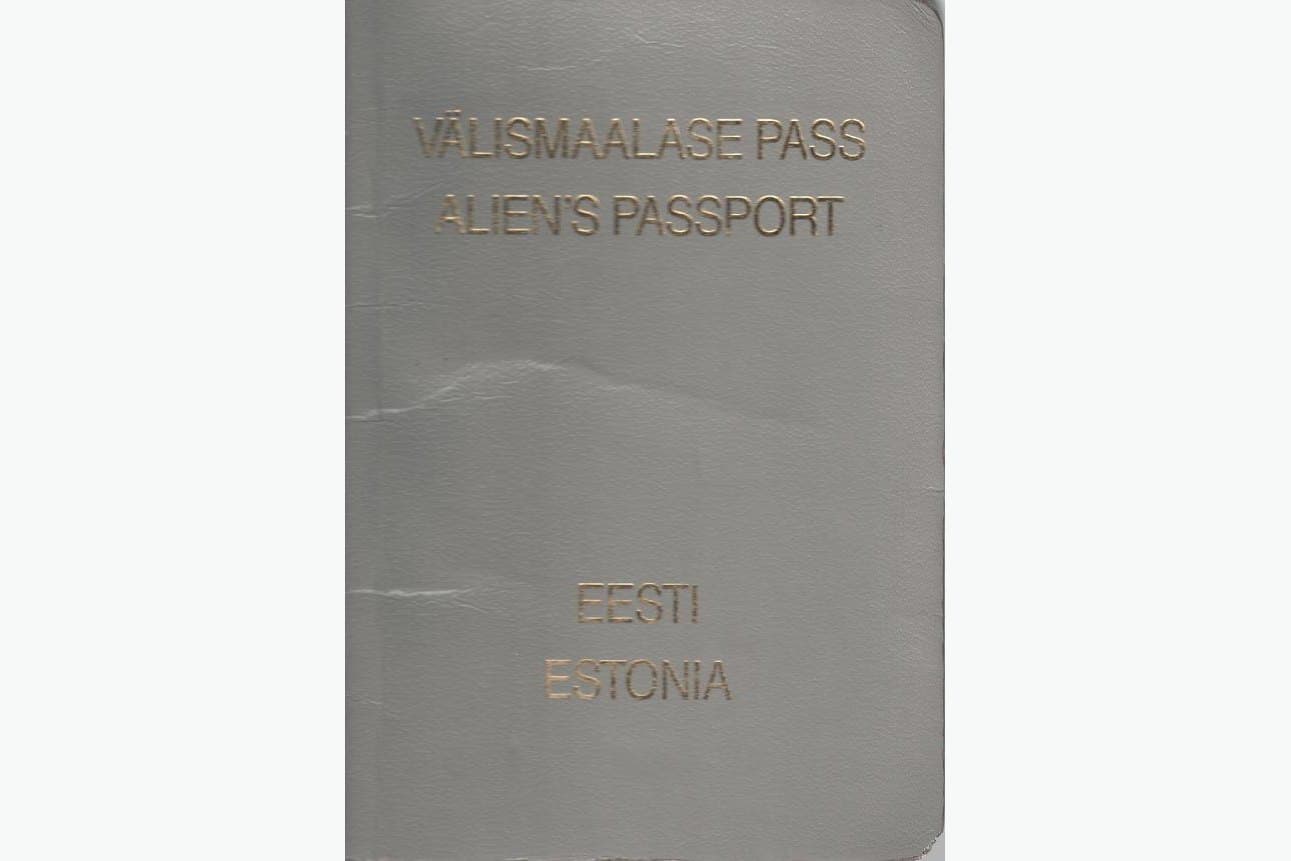 The cover of an Estonian alien's passport, grey with gold lettering
